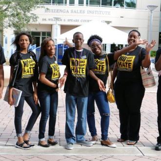 A group of ADL students who participate as peer trainers.