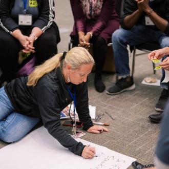 Woman white boarding on the floor