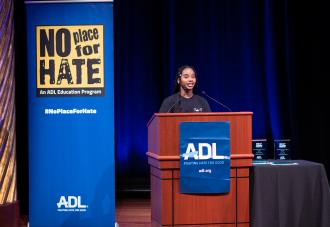 Student speaking at podium